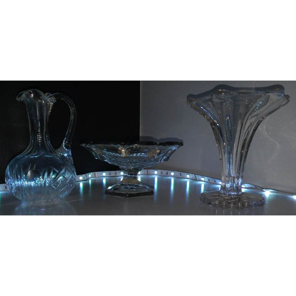 Old vinegar cruet with various other glassware pieces candy dish and small vase